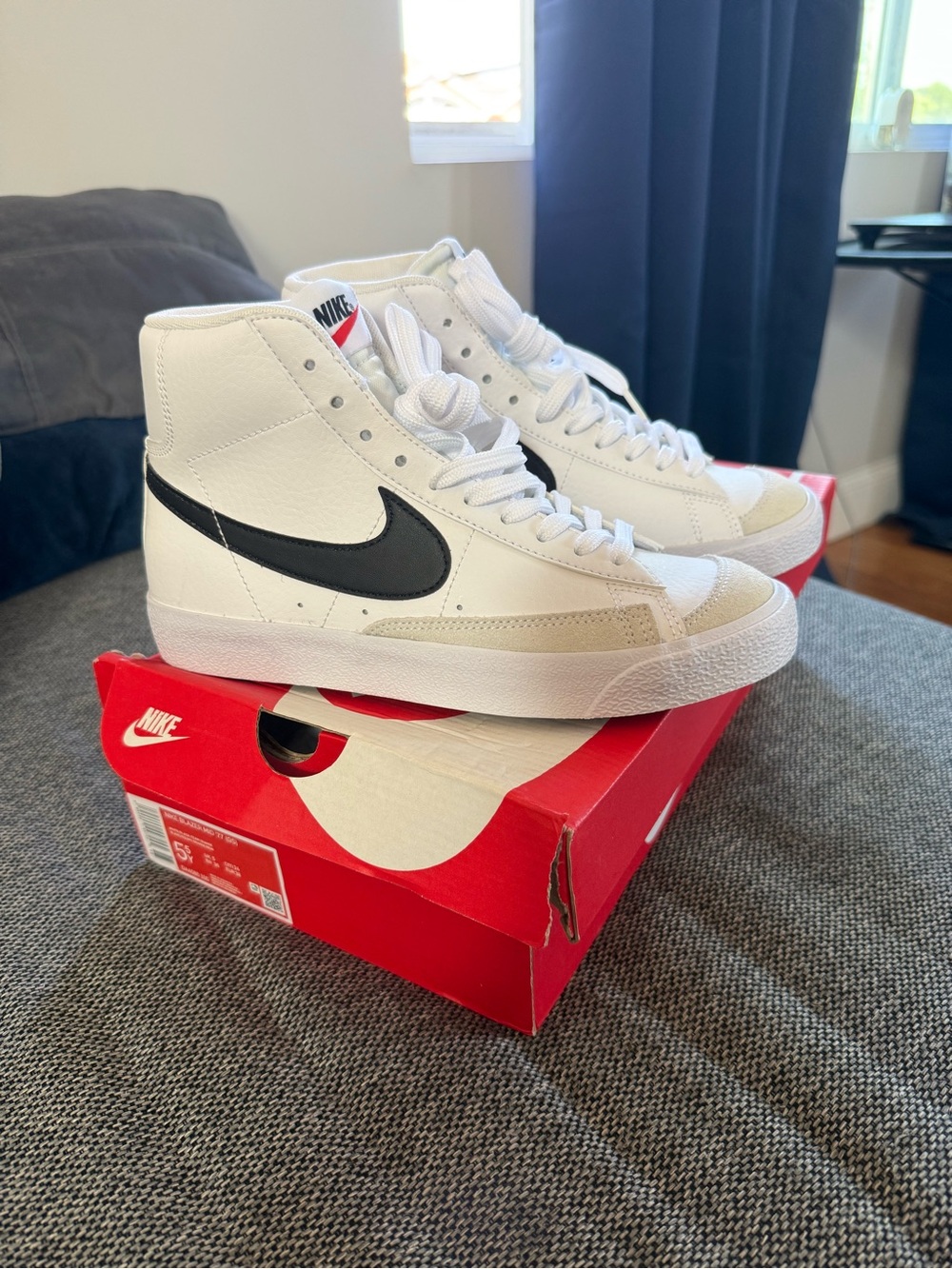 Nike Blazer Mid White/Black High-Top Sneakers (grade school)